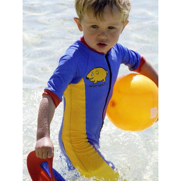 a little boy wearing ozi varmints all in one zip swimsuit